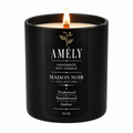 Maison Noir Collection candle in Amber scent, lit, on a white background