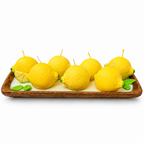 Citrus Grove Candle - hand-poured lemon-shaped soy wax candles on a wood tray with green leaf accents